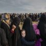 Civilians line up for an aid distribution in the Mamun neighbourhood, Iraq, having remained in west Mosul during the battle to retake the city.  2017
